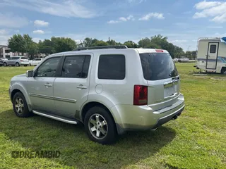 2010 Honda Pilot Touring with VIN 5FNYF3H86AB015716, listed as a Copart auction lot 54362235 with 229,256 mi miles and Clean Title. Bid and sale history available at carsss.com. Image 3.