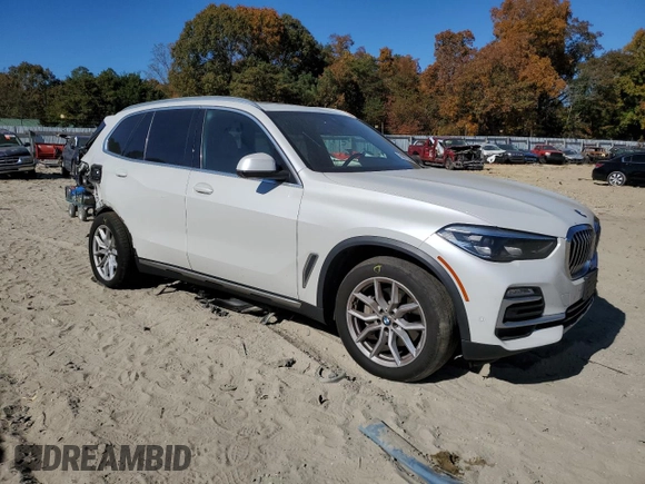 2019 BMW X5 xDrive40i with VIN 5UXCR6C55KLL37907, listed as a Copart auction lot 76977334 with 115,355 mi miles and Salvage Title. Bid and sale history available at carsss.com. Image 4.