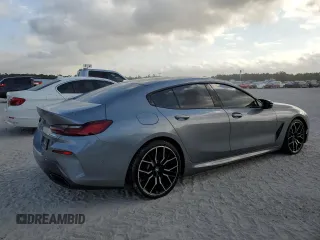 2023 BMW 8 Series M850i with VIN WBAGV8C02PCL20503, listed as a Copart auction lot 53725695 with 0 mi miles and Salvage Title. Bid and sale history available at carsss.com. Image 3.