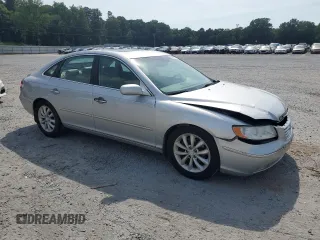2006 Hyundai Azera SE with VIN KMHFC46F66A133655, listed as a Copart auction lot 62291215 with 122,998 mi miles and Salvage title. Bid and sale history available at DreamBid. Image 4.