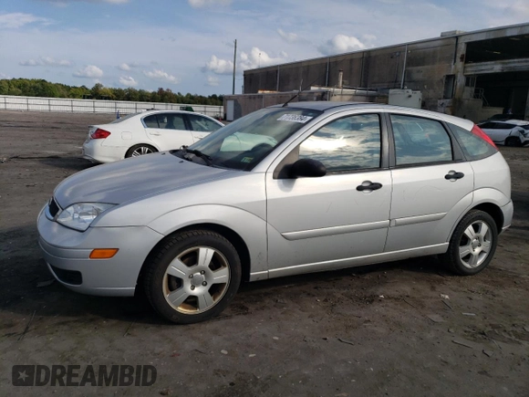 2007 Ford Focus S with VIN 1FAHP37N67W268162, listed as a Copart auction lot 71736384 with 69,391 mi miles and Salvage Title. Bid and sale history available at DreamBid. Image 1.