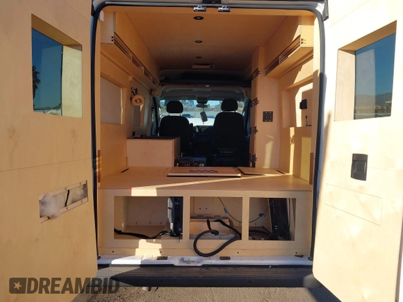 2021 Ram ProMaster Cargo with VIN 3C6LRVBG8ME539769, listed as a IAAI auction lot 40813813 with 39,935 mi miles. Bid and sale history available at carsss.com. Image 8.