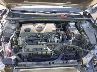 2019 Toyota Camry LE with VIN 4T1B11HK2KU240465, listed as a IAAI auction lot 42095075 with 67,852 mi miles and . Bid and sale history available at DreamBid. Image 10.