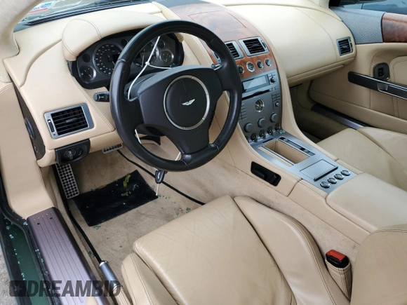 2005 Aston Martin DB9 z VIN SCFAD01A95GA02851, wystawiony jako Copart lot #63535783 z przebiegiem 40 729 mil mil oraz . Historia ofert i sprzedaży dostępna na DreamBid. Obrazek 8.