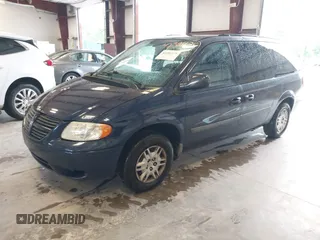 2005 Dodge Caravan SE with VIN 1D4GP24R55B294220, listed as a IAAI auction lot 42381175 with 260,980 mi miles and . Bid and sale history available at DreamBid. Image 2.