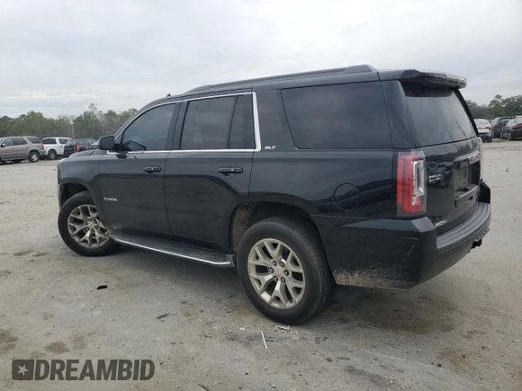 2015 GMC Yukon SLT with VIN 1GKS1BKC1FR615562, listed as a Copart auction lot 46374135 with 141,207 mi miles and Salvage Title. Bid and sale history available at carsss.com. Image 2.