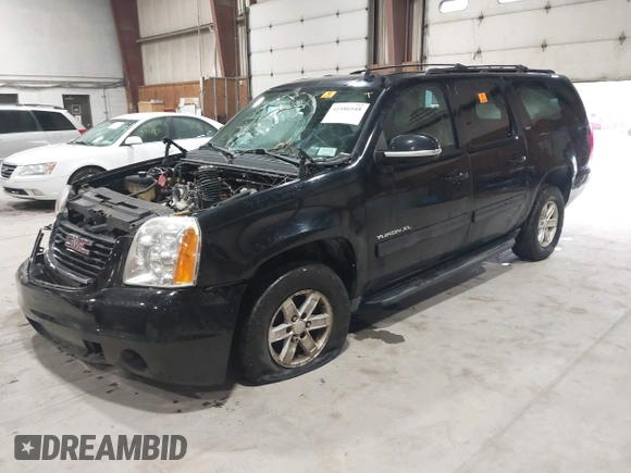 2013 GMC Yukon XL SLT with VIN 1GKS2KE70DR296356, listed as a IAAI auction lot 41986948 with 274,445 mi miles. Bid and sale history available at carsss.com. Image 2.