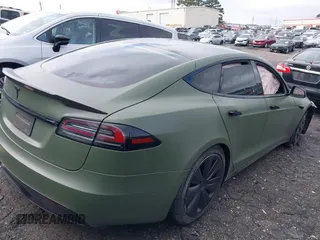 2022 Tesla Model S with VIN 5YJSA1E50NF487306, listed as a IAAI auction lot 41570528 with Not Provided miles and . Bid and sale history available at DreamBid. Image 4.