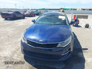 2016 Kia Optima LX Turbo with VIN 5XXGT4L13GG030586, listed as a IAAI auction lot 41824682 with 147,401 mi miles. Bid and sale history available at carsss.com. Image 6.