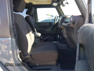 2014 Jeep Wrangler Sport with VIN 1C4AJWAGXEL177449, listed as a IAAI auction lot 41741519 with 117,056 mi miles and . Bid and sale history available at carsss.com. Image 5.