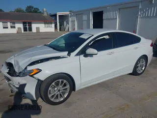 2019 Ford Fusion SE with VIN 3FA6P0HD1KR217840, listed as a IAAI auction lot 42011309 with 85,945 mi miles and . Bid and sale history available at carsss.com. Image 14.