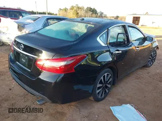 2018 Nissan Altima 2.5 S with VIN 1N4AL3AP7JC196940, listed as a IAAI auction lot 41767112 with 124,736 mi miles. Bid and sale history available at carsss.com. Image 4.