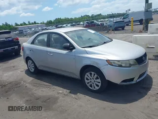 2010 Kia Forte LX with VIN KNAFT4A25A5047454, listed as a IAAI auction lot 42187880 with 155,396 mi miles. Bid and sale history available at carsss.com. Image 1.
