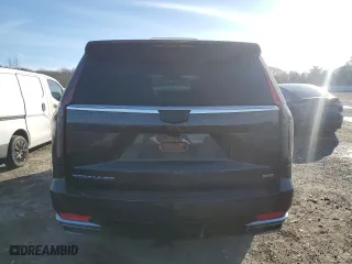 2021 Cadillac Escalade Premium Luxury Platinum with VIN 1GYS4DKL2MR100902, listed as a Copart auction lot 42522595 with 60,770 mi miles and Salvage Title. Bid and sale history available at carsss.com. Image 6.