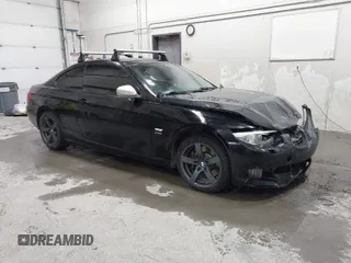 2011 BMW 3 Series 335i xDrive with VIN WBAKF9C53BE247177, listed as a IAAI auction lot 41973181 with 113,986 mi miles. Bid and sale history available at carsss.com. Image 1.