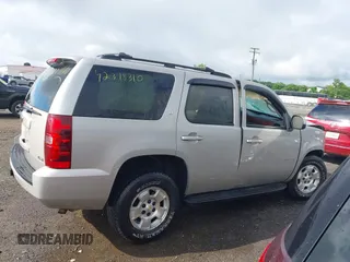 2007 Chevrolet Tahoe LTZ with VIN 1GNFK13097J406134, listed as a IAAI auction lot 42318310 with 137,106 mi miles and . Bid and sale history available at DreamBid. Image 13.
