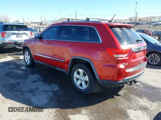 2011 Jeep Grand Cherokee 70th Anniversary with VIN 1J4RR4GT2BC703163, listed as a IAAI auction lot 41763149 with 184,523 mi miles. Bid and sale history available at carsss.com. Image 3.