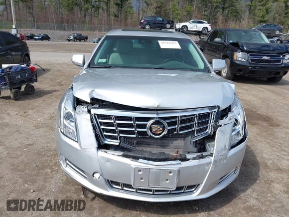 2013 Cadillac XTS Luxury z VIN 2G61P5S33D9170453, wystawiony jako IAAI lot #41928607 z przebiegiem 68 094 mil mil oraz . Historia ofert i sprzedaży dostępna na DreamBid. Obrazek 12.