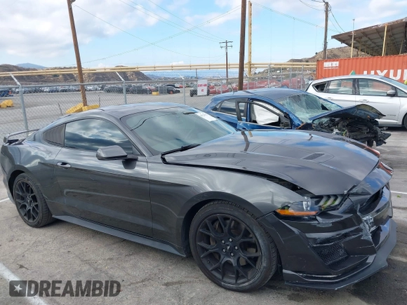 2018 Ford Mustang EcoBoost z VIN 1FA6P8THXJ5154523, wystawiony jako IAAI lot #41523923 z przebiegiem 94 330 mil mil oraz . Historia ofert i sprzedaży dostępna na DreamBid. Obrazek 13.