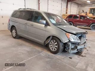 2010 Honda Odyssey EX-L with VIN 5FNRL3H66AB056827, listed as a IAAI auction lot 41891595 with 162,229 mi miles. Bid and sale history available at carsss.com. Image 1.