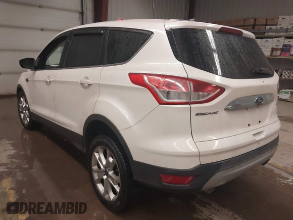 2013 Ford Escape SEL with VIN 1FMCU9H98DUD82751, listed as a IAAI auction lot 41575198 with 166,580 mi miles. Bid and sale history available at carsss.com. Image 3.