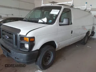 2011 Ford Econoline Cargo Commercial with VIN 1FTNE2EW9BDB11058, listed as a IAAI auction lot 42202069 with 282,179 mi miles. Bid and sale history available at carsss.com. Image 2.