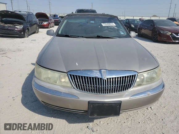 2002 Lincoln Continental with VIN 1LNHM97V32Y647800, listed as a Copart auction lot 75240874 with 71,689 mi miles and Salvage Title. Bid and sale history available at carsss.com. Image 5.