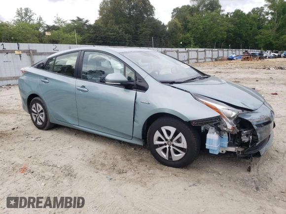 2017 Toyota Prius Two z VIN JTDKARFU9H3031195, wystawiony jako Copart lot #56852615 z przebiegiem 56 481 mil mil oraz Szkoda całkowita • Salvage title. Historia ofert i sprzedaży dostępna na DreamBid. Obrazek 4.