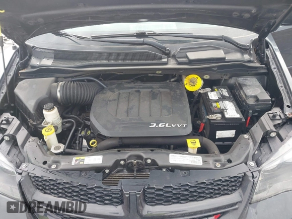 2015 Dodge Grand Caravan SE with VIN 2C4RDGBG8FR669355, listed as a IAAI auction lot 41486867 with 189,650 mi miles and . Bid and sale history available at DreamBid. Image 10.