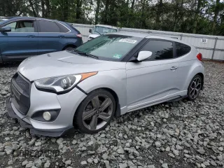 2014 Hyundai Veloster Turbo with VIN KMHTC6AE7EU199769, listed as a Copart auction lot 57204855 with 173,730 mi miles and Salvage title. Bid and sale history available at DreamBid. Image 1.