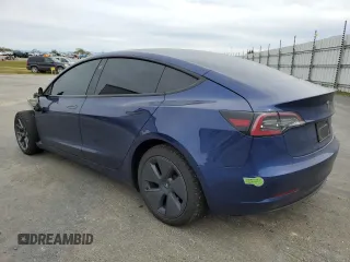2023 Tesla Model 3 Long Range with VIN 5YJ3E1EB0PF388986, listed as a Copart auction lot 49823045 with 93,870 mi miles and Salvage Title. Bid and sale history available at DreamBid. Image 2.
