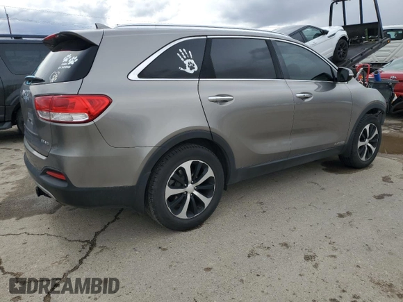 2016 Kia Sorento EX with VIN 5XYPHDA59GG129660, listed as a Copart auction lot 49499595 with 104,784 mi miles and Salvage Title. Bid and sale history available at carsss.com. Image 3.