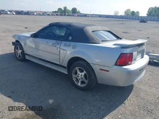 2002 Ford Mustang Deluxe with VIN 1FAFP44432F205991, listed as a IAAI auction lot 42144709 with 138,119 mi miles and . Bid and sale history available at DreamBid. Image 3.