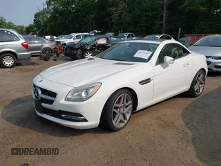 2015 Mercedes-Benz SLK 250 z VIN WDDPK4HA2FF100514, wystawiony jako IAAI lot #42414167 z przebiegiem 120 615 mil mil oraz . Historia ofert i sprzedaży dostępna na DreamBid. Obrazek 17.