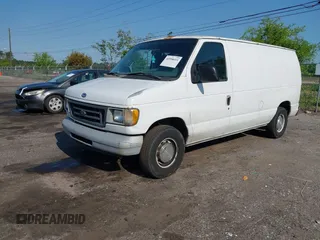 1999 Ford Econoline Cargo with VIN 1FTRE1420XHA34056, listed as a IAAI auction lot 41998411 with 236,267 mi miles. Bid and sale history available at carsss.com. Image 17.