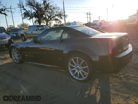 2006 Cadillac XLR z VIN 1G6YX36D965602114, wystawiony jako Copart lot #80151794 z przebiegiem Nie podano mil oraz Szkoda całkowita • Salvage title. Historia ofert i sprzedaży dostępna na DreamBid. Obrazek 2.