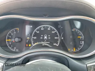 2017 Jeep Grand Cherokee Overland with VIN 1C4RJFCGXHC941983, listed as a Copart auction lot 52008825 with 65,776 mi miles and Salvage Title. Bid and sale history available at carsss.com. Image 9.
