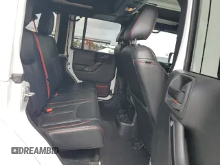 2017 Jeep Wrangler Unlimited Rubicon z VIN 1C4HJWFG6HL692928, wystawiony jako Copart lot #60049775 z przebiegiem 145 033 mil mil oraz Nie do naprawy • Non repairable. Historia ofert i sprzedaży dostępna na DreamBid. Obrazek 10.