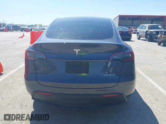 2023 Tesla Model Y Long Range with VIN 7SAYGDEE4PA037218, listed as a IAAI auction lot 42232704 with 18,756 mi miles and . Bid and sale history available at DreamBid. Image 17.