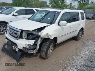 2011 Honda Pilot Touring z VIN 5FNYF4H96BB106873, wystawiony jako IAAI lot #42154795 z przebiegiem 162 282 mil mil oraz . Historia ofert i sprzedaży dostępna na DreamBid. Obrazek 2.