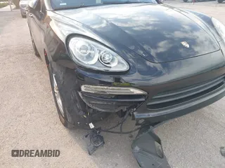 2014 Porsche Cayenne with VIN WP1AA2A28ELA06484, listed as a IAAI auction lot 41655867 with 179,441 mi miles and . Bid and sale history available at DreamBid. Image 6.
