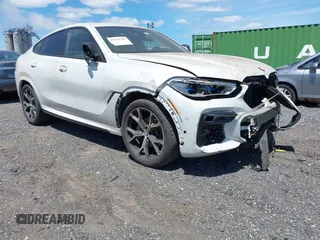 2020 BMW X6 xDrive40i z VIN 5UXCY6C08L9B42179, wystawiony jako IAAI lot #42258700 z przebiegiem 30 498 mil mil oraz . Historia ofert i sprzedaży dostępna na DreamBid. Obrazek 1.