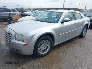 2010 Chrysler 300 Touring with VIN 2C3CA5CV1AH272993, listed as a IAAI auction lot 42154073 with 224,685 mi miles and . Bid and sale history available at DreamBid. Image 2.