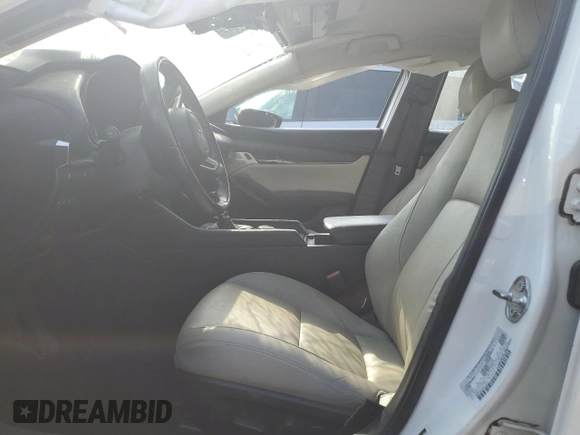 2019 Mazda 3 Preferred with VIN 3MZBPADL0KM113572, listed as a Copart auction lot 75737004 with 56,543 mi miles and Salvage Title. Bid and sale history available at DreamBid. Image 7.