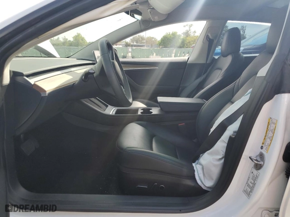 2023 Tesla Model 3 with VIN 5YJ3E1EA6PF396808, listed as a Copart auction lot 50606185 with 27,838 mi miles and Salvage Title. Bid and sale history available at carsss.com. Image 7.