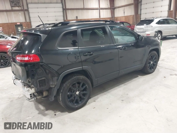 2014 Jeep Cherokee Latitude with VIN 1C4PJMCS6EW299532, listed as a IAAI auction lot 41833888 with 199,915 mi miles and . Bid and sale history available at DreamBid. Image 4.