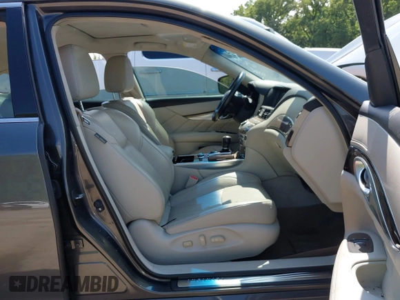 2012 Infiniti M Hybrid with VIN JN1EY1AP4CM910962, listed as a IAAI auction lot 42597542 with 187,171 mi miles and . Bid and sale history available at DreamBid. Image 5.
