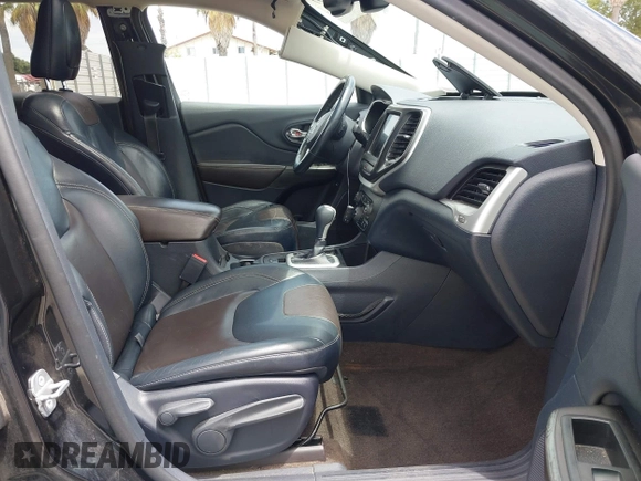 2014 Jeep Cherokee Limited z VIN 1C4PJLDB9EW162416, wystawiony jako IAAI lot #42779797 z przebiegiem 158 581 mil mil oraz . Historia ofert i sprzedaży dostępna na DreamBid. Obrazek 5.