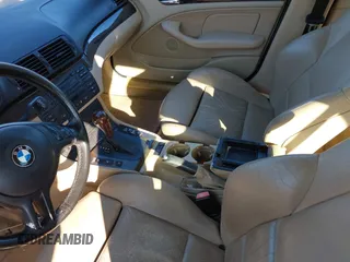 2002 BMW 3 Series 325i with VIN WBAET37492NG77657, listed as a IAAI auction lot 41691705 with 163,700 mi miles. Bid and sale history available at carsss.com. Image 5.
