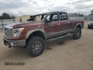 2016 Nissan Titan XD PRO-4X with VIN 1N6BA1F44GN509914, listed as a Copart auction lot 44417905 with 0 mi miles and Salvage Title. Bid and sale history available at carsss.com. Image 1.